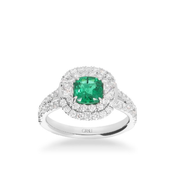 White gold rosette ring with cushion-cut emerald and double halo of diamonds