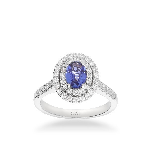 Rosette ring with oval-cut blue sapphire (0.77ct) and double halo of diamonds