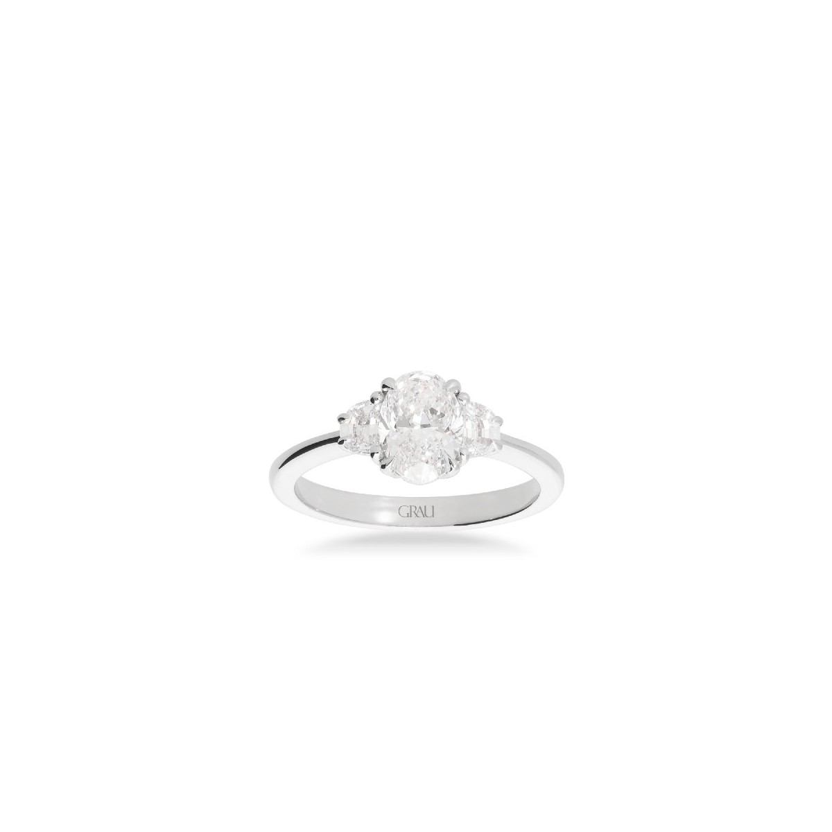 Anell d’Or Blanc amb Diamant Oval de 1.20 ct i Diamants Mitja Lluna