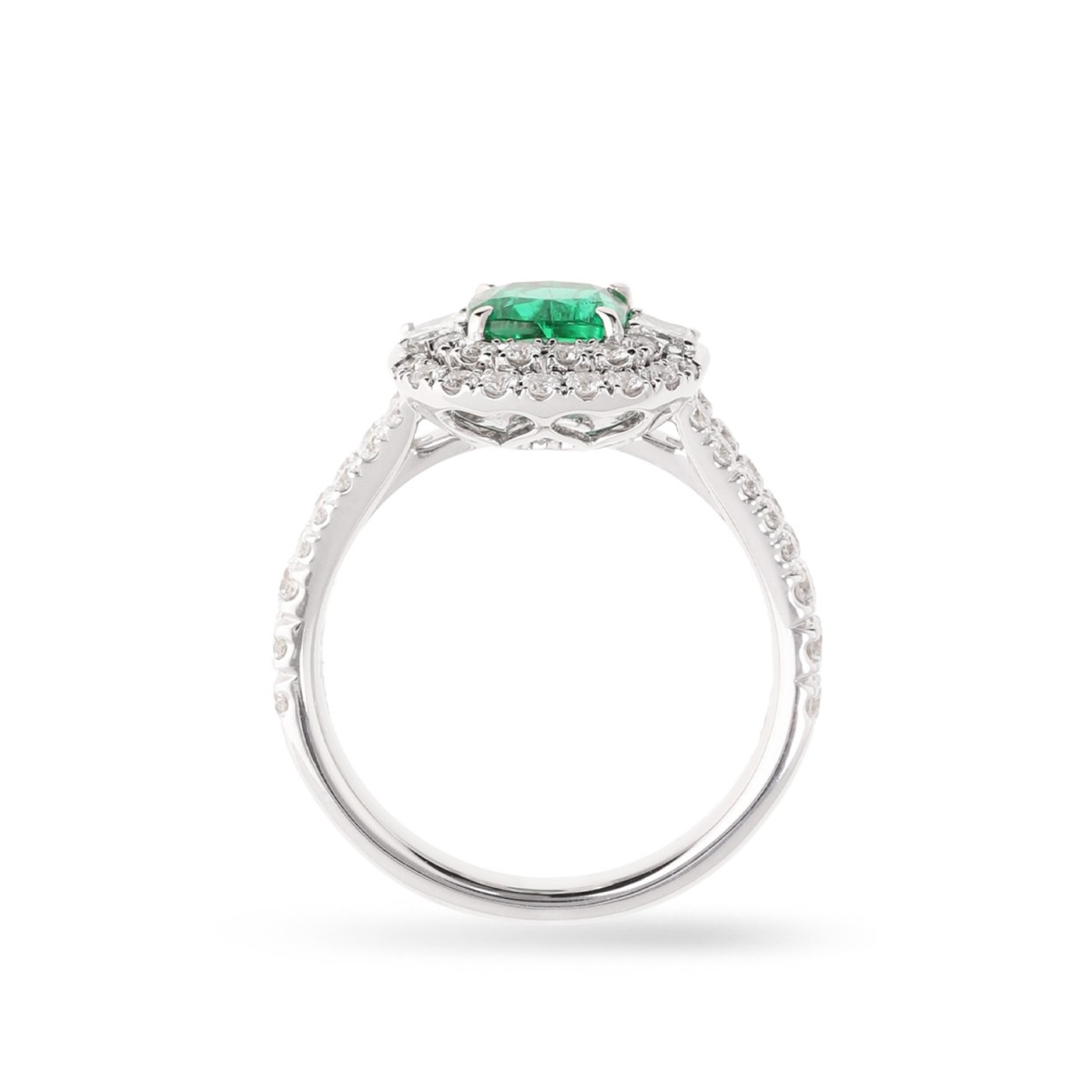 White gold rosette ring with cushion-cut emerald and double halo of diamonds