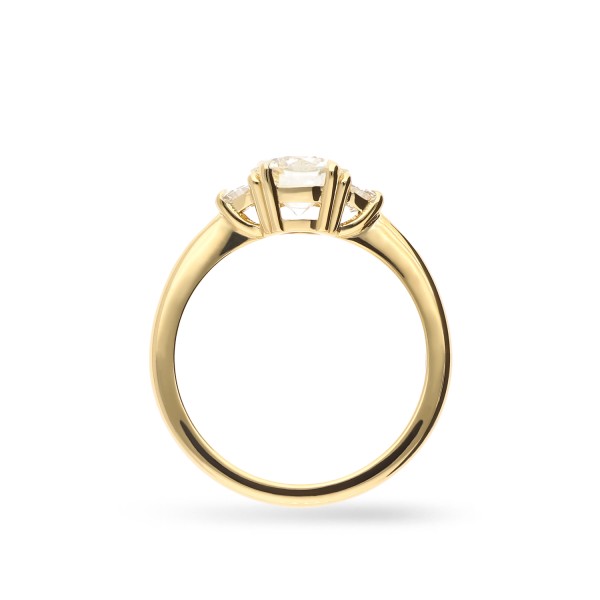 Anillo Trilogy en Oro amarillo con Diamante Central