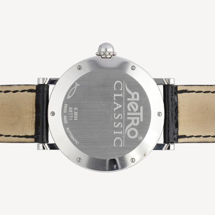 Gérald Genta steel watch and black strap