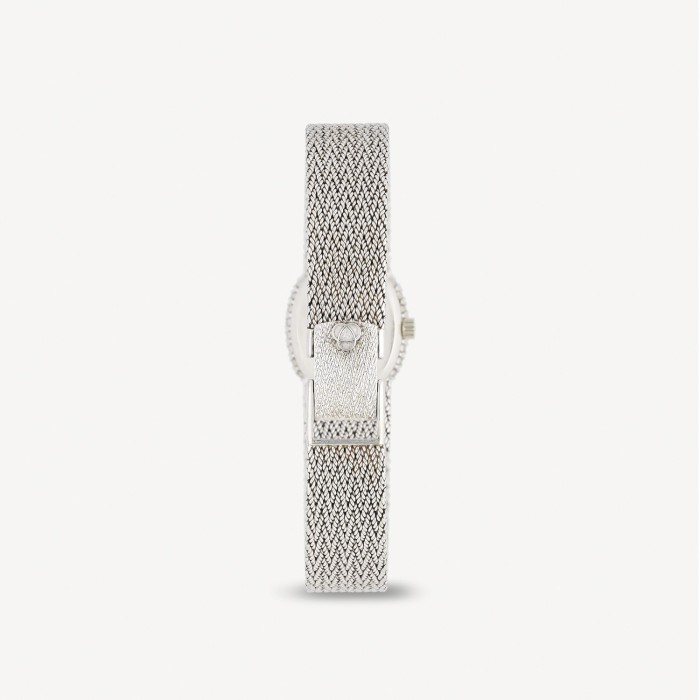 Reloj Universal Geneve oro blanco y malaquita