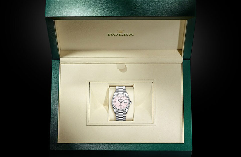 Rolex Day-Date 36, oro blanco, diamantes y esfera rosa engastada de diamantes en su estuche Joyería Grau