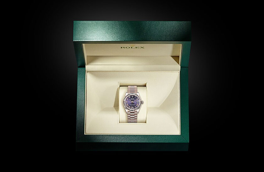 Reloj Rolex Datejust 31 esfera «aubergine» engastada de diamantes en su estuche Joyería Grau