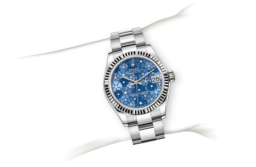 Simulated wrist Rolex Datejust 31 azzurro blue dial, floral motif set with diamonds at Joyería Grau